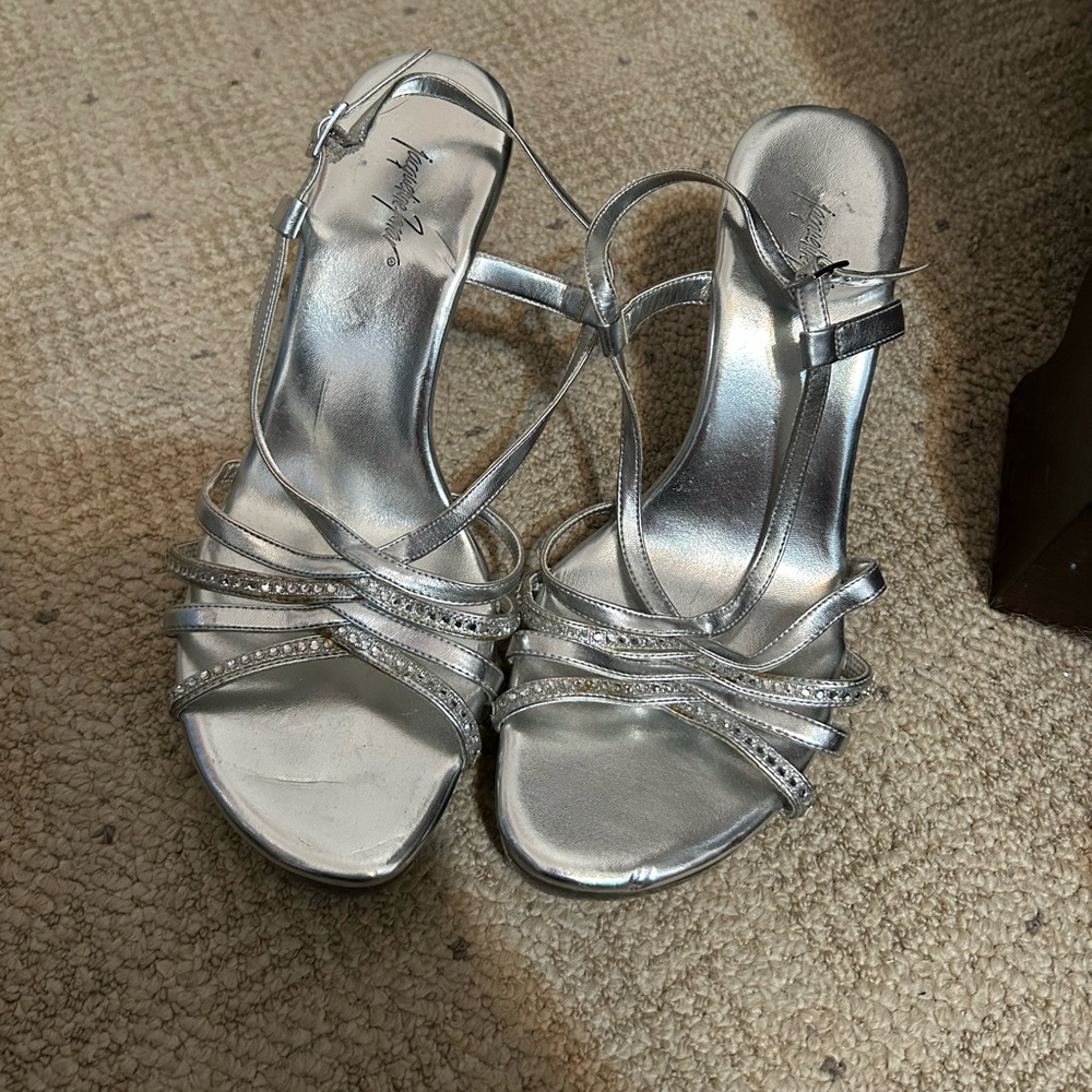 Slightly used silver little heel